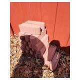Stack of Interlocking Red Edging Bricks