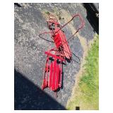 Red Wooden Sleds and Chair