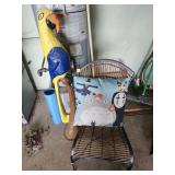 Metal Chair and Parrot Sculpture
