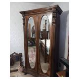 Wooden Armoire With Mirrored Doors