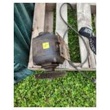 Electric Motor With Wire Brush Attachment