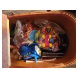 Wicker Basket With Assorted Toys and Figures