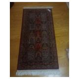 Rectangular Wool Area Rug with Fringe
