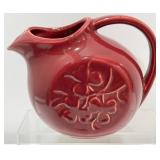 Red Ceramic Pitcher with Floral Design