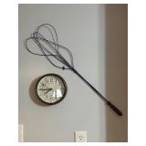 Wall Clock and Blue Wire Rug Beater