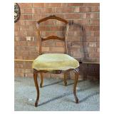 Wooden Chair With Carved Floral Details