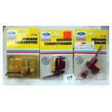 (3) Ford NH Collectible Farm Implements