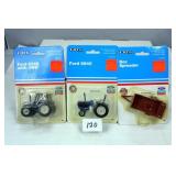 (2) Ford NH Collectible Tractors, (1) NH Implement