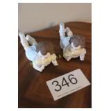 Pair of Reclining Bisque Porcelain Piano Babies