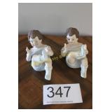 Pair of Bisque Porcelain Sitting Piano Babies