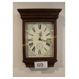 Howard Miller Oak Framed Wall Clock