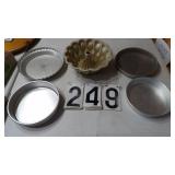 3) Pans, 1 Bundt Pann 1 Pie Tin
