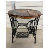 Re Purposed table made from antique sewing..