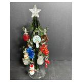 Christams tree made of blown glass with ornaments.