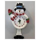 Battery operated snowman clock