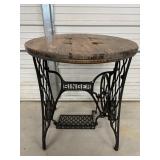 Re Purposed table made from antique sewing..