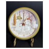 Battery operated snowman clock