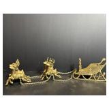 Vtg Brass reindeer pulling a brass Christmas..