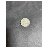 1958 Franklin half dollar with D mint mark