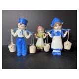 Vtg porcelain dutch boy & gilr carrying water...
