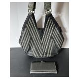 Michael Kors purse & bifold purse is missing..