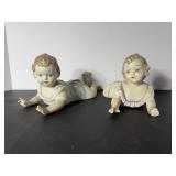 Bisque porcelain piano babies - girls leg has...