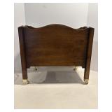 Wooden magazine rack or record holder on...