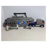 Hot Wheels semi truck & John Jorce race car...