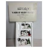 Dept. 56 Snow Village "A herd of holiday heifers"