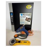 Hot glue gun, (2) rotary cutters & art portfolio