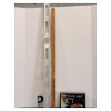 4-foot level & (3) yard sticks & led flash light..