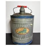 Old Blue metal gas can 11' dia x 12.5'H