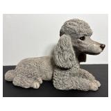 Sandy cast poodle dog
