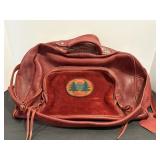 Mary Sishlak leather travel bag