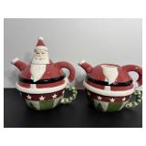 Decorative Santa teapots - one missing Santa...