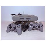 Vtg Sony Play Station console including a game...