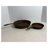 2 cast iron pans