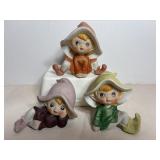 Vtg Homeo porcelain pixie figurines 4"H