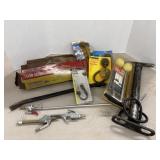 Grease gun, tire pump, crow bar & misc tools