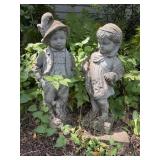 Cement boy & girl statues 27'H & 24'H