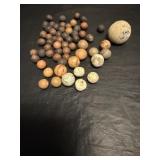 Antique unglazed earthware or clay marbles ...