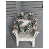 Child's Wicker Chair with flowered wreath