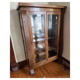 Vtg Golden oak double- door curio & china display.