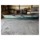 Pelican 3-seated canoe with title.