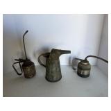 Oil cans & oil spout can.