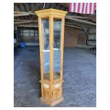 Lighted Curio cabinet 24.5"W x 11"D x 71"H.