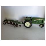 1800 Oliver tractor with 4 bottom plow.