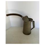 Oil spout can.