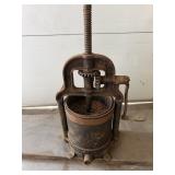 Antique cast-iron sausage stuffers & fruit press.