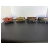 Vtg tin lithographed tot train cars.